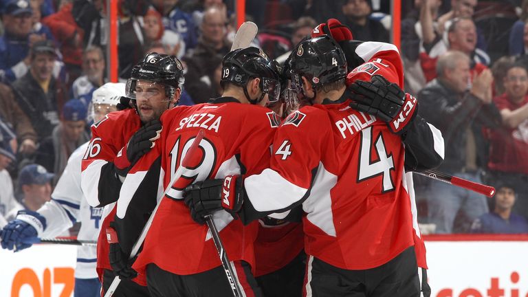 Clarke MacArthur #16 of the Ottawa Senators celebrates his first period power-play goal with team mates