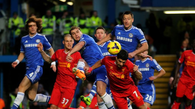 LONDON, ENGLAND - DECEMBER 29:  Luis Suarez of Liverpool directs a header on goal during the Barclays Premier League match between Chelsea and Liverpool at