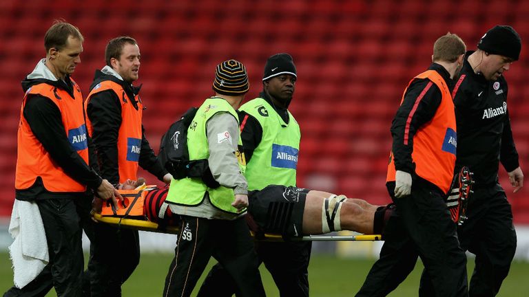 Alistair Hargreaves of Saracens leaves the pitch concussed