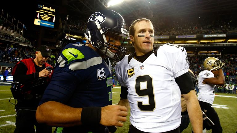 Quarterbacks Russell Wilson of the Seattle Seahawks and Drew Brees of the New Orleans Saints