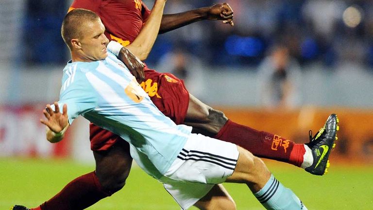 Erik Cikos: Defender has joined Ross County on loan from Slovan Bratislava