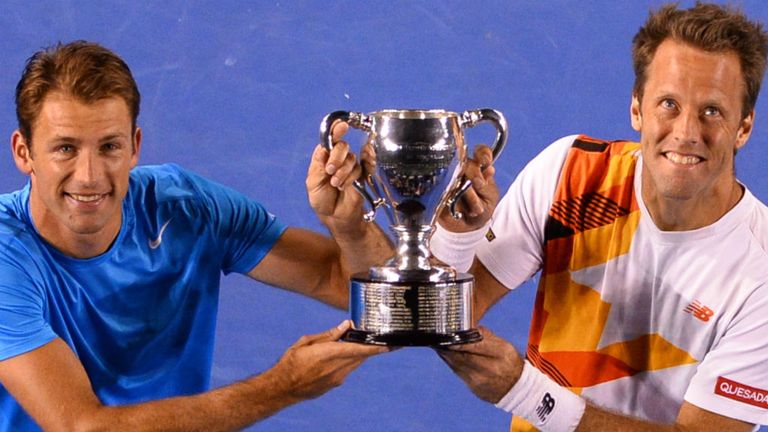 - Kubot and Swedens Robert Lindstedt celebrate with the trophy after winning the mens doubles final