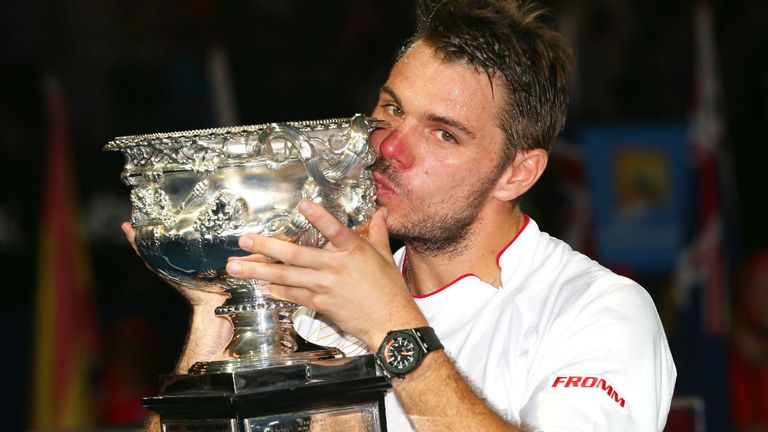 - Wawrinka of Switzerland kisses the Norman Brookes Challenge Cup after winning his mens final match against Rafael Nadal