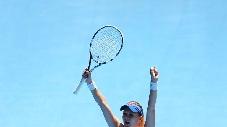 Agnieszka Radwanska of Poland celebrates winning her quarterfinal match against Victoria Azarenka of Belarus during day 10 of the Australian Open