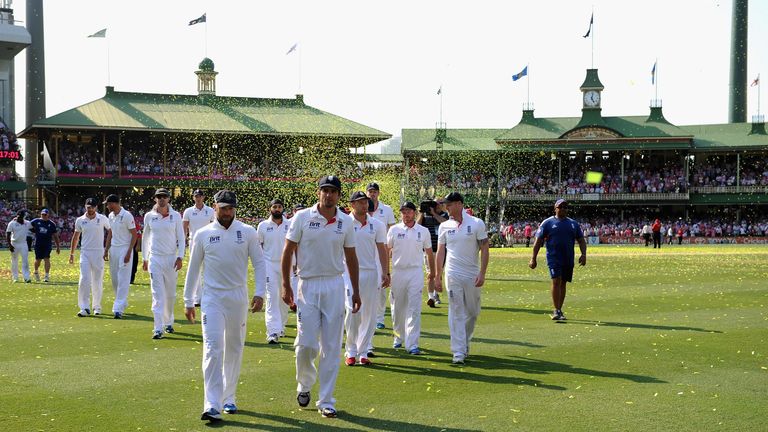 England captain Alastair Cook leads his team from the field at SCG, Sydney. Jan 5 2014.