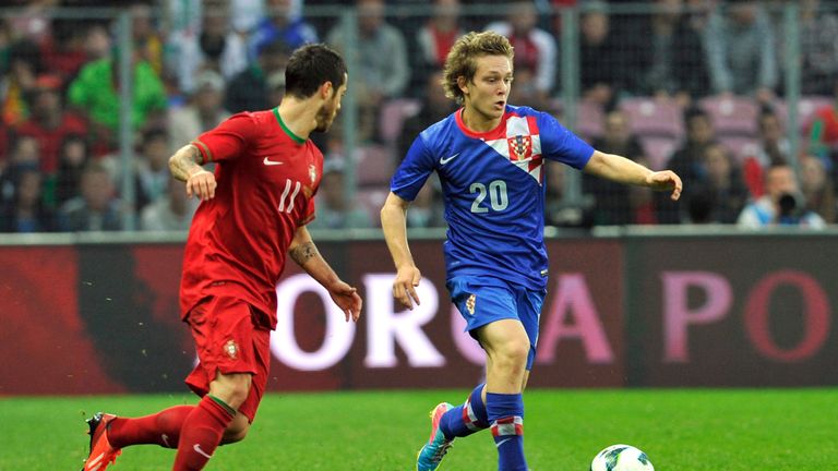 Alen Halilovic of Croatia fights for the ball with Adelino Vieirinha of Portugal during the international friendly in 2013