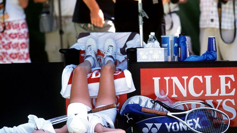 Martina Hingisfeels the 47 degree court-side heat against Jennifer Capriati during the 2002 Australian Open final