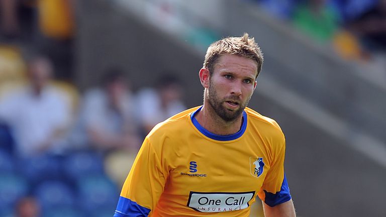 John McCombe of Mansfield Town in action during the pre-season friendly against Nottingham Forest