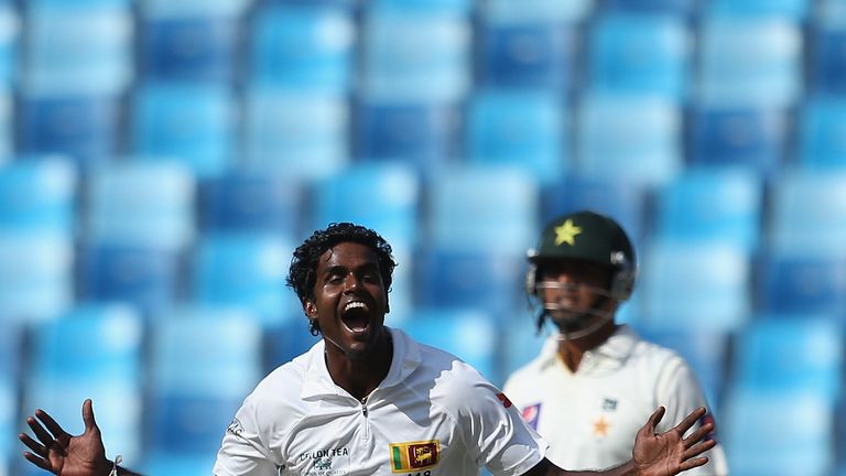 Shaminda Eranga of Sri Lanka celebrate after dismissing Younis Khan of Pakistan during day one of the second Test in Dubai