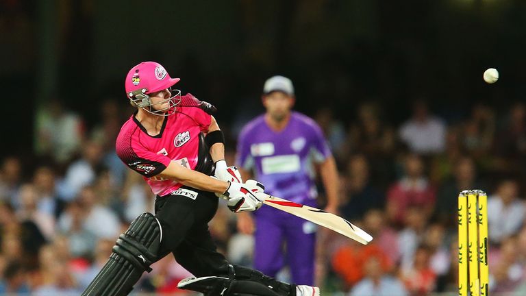 SYDNEY, AUSTRALIA - JANUARY 15:  Steve Smith of the Sixers plays a sweep shot during the Big Bash League match between the Sydney Sixers and the Hobart Hur
