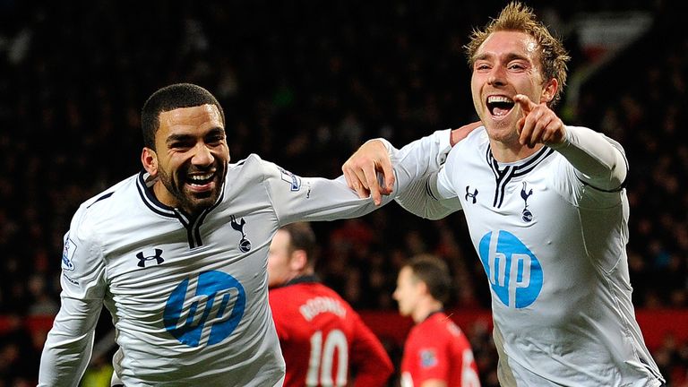 Christian Eriksen (R) celebrates during the English Premier League football match between Manchester United and Tottenham Hotspur