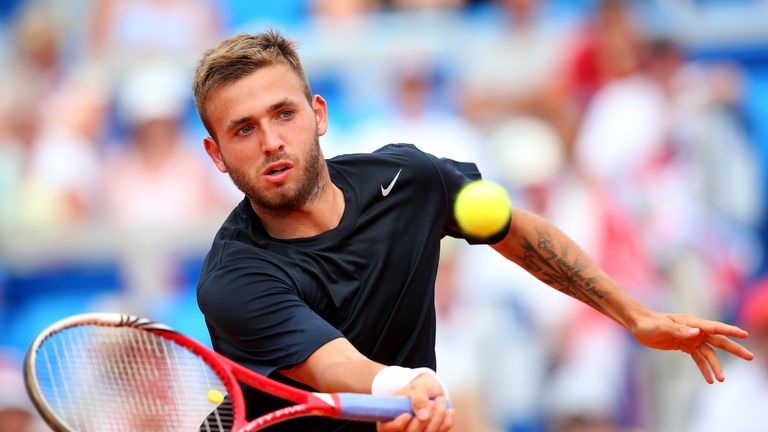 Daniel Evans of Great Britain in action against Mate Pavic of Croatia during day three of the Davis Cup World Group play-off