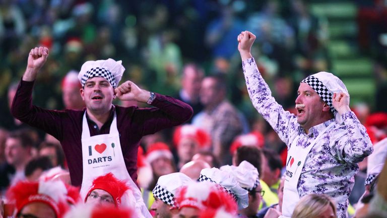 Darts fans in fancy dress at World Darts Championship on Day One at Alexandra Palace
