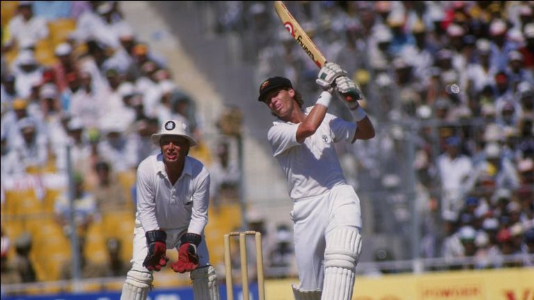 Dean Jones of Australia crashes a boundary during the final of the 1987 Cricket World Cup final between Australia and England in Calcutta.