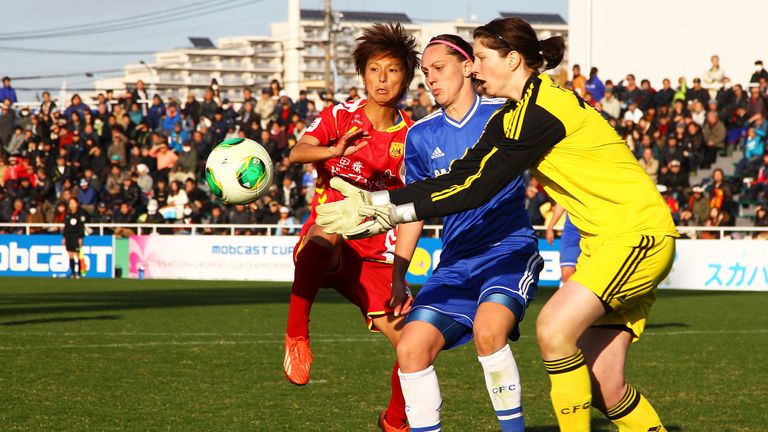 TOKYO, JAPAN - DECEMBER 08: Chiaki Minamiyam #6 of INAC Kobe Leonessa and Marie hourihan #13 and Emma Wilhelmsson #18 compete for the ball during the Inter