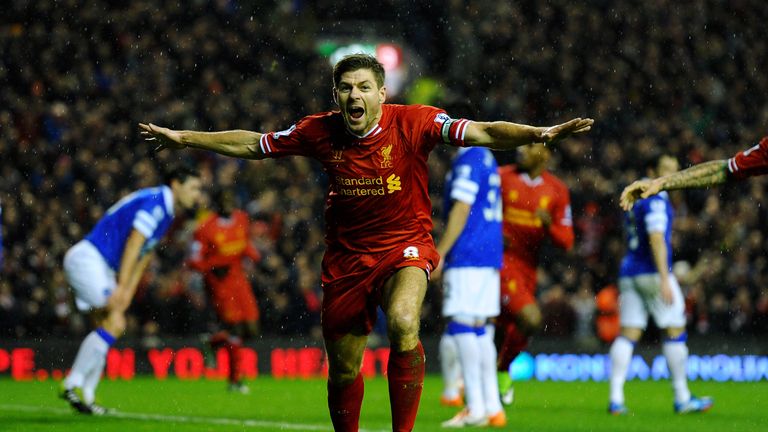 Steven Gerrard of Liverpool celebrates after scoring the opening goal against Everton