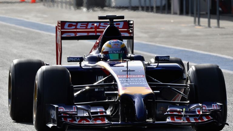 Jean-Eric Vergne heads down the pitlane in the Toro Rosso
