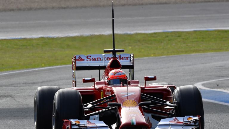 Kimi Raikkonen returns to the pits in the F14-T