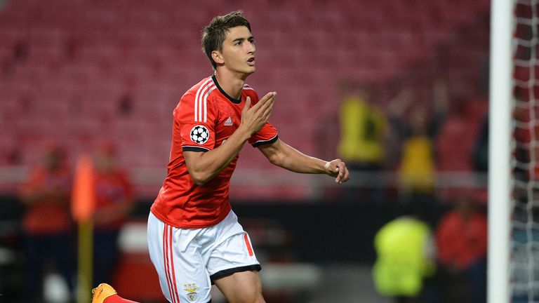 LISBON, PORTUGAL - SEPTEMBER 17:  Filip Djuricic of SL Benfica celebrates scoring the opening goal of the match during the UEFA Champions League group stag