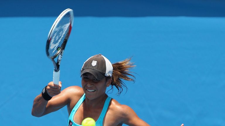 Heather Watson of Great Britain plays a backhand in her match against Arina Rodionova of Australia during qualifying for the Australian Open