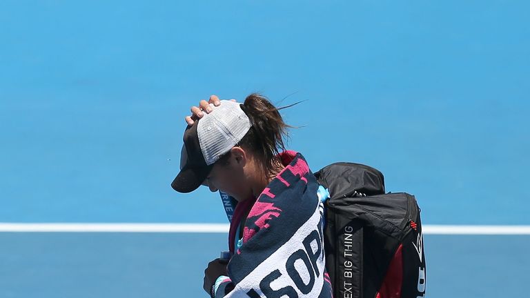 Heather Watson of Great Britain walks off after losing her first round match against Daniela Hantuchova of Slovakia at the Australian Open