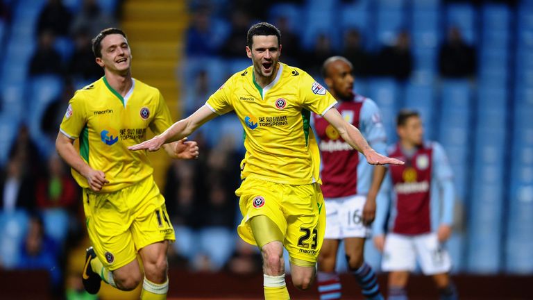 Jamie Murphy of Sheffield United celebrates scoring the opening goal during the FA Cup Third Round match with Aston Villa.