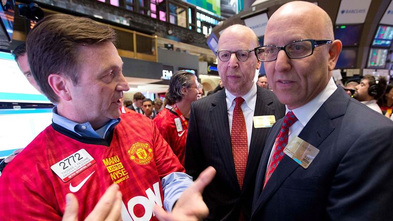NEW YORK, NY - AUGUST 10:  In this handout photo provided by the NYSE Euronext, Manchester United Executives Joel Glazer (R) and Avram Glazer (C) arrive to