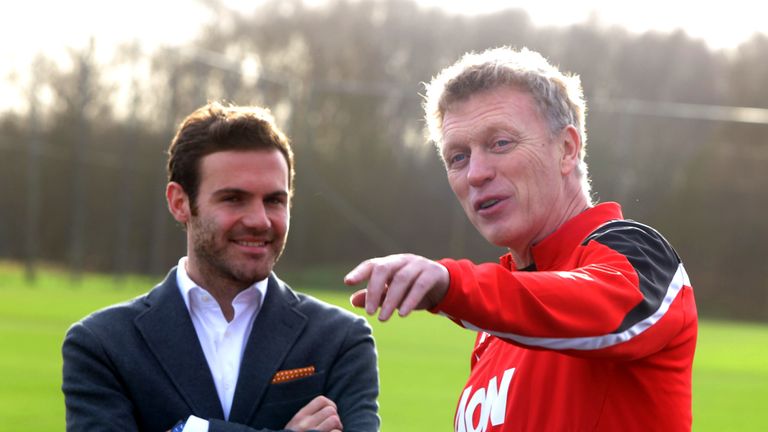 Manager David Moyes of Manchester United welcomes Juan Mata ahead of his medical