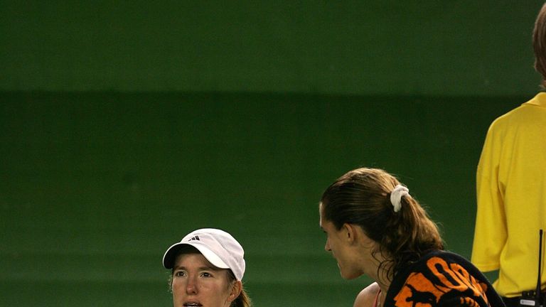 Justine Henin-Hardenne is consoled by Amelie Mauresmo after the 2002 Australian Open final