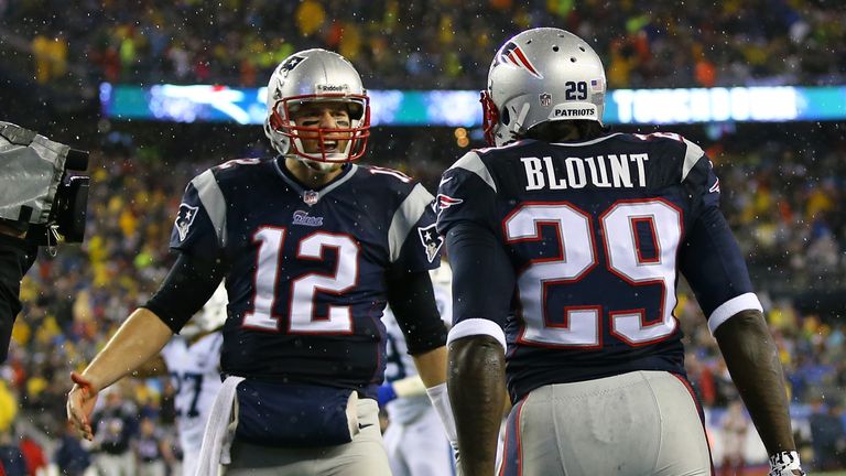 LeGarrette Blount of the New England Patriots celebrates with teammate Tom Brady