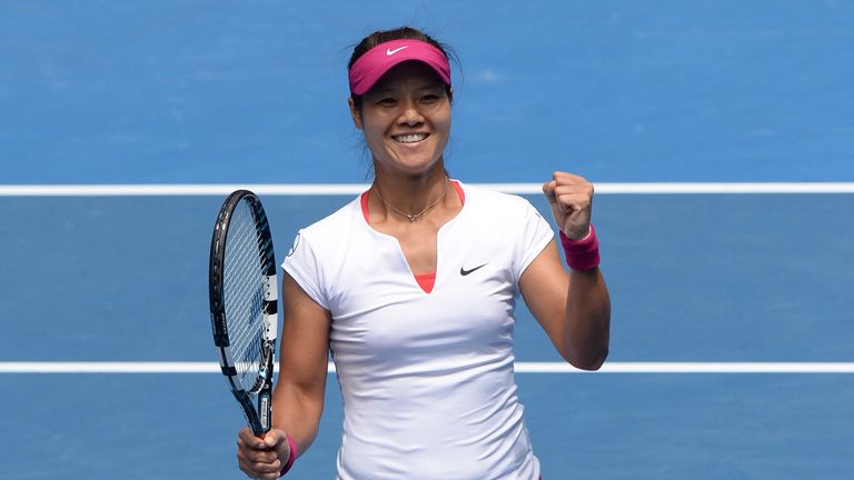 China's Li Na celebrates after victory in her women's singles match against Italy's Flavia Pennetta on day nine at the 2014 Australian Open 