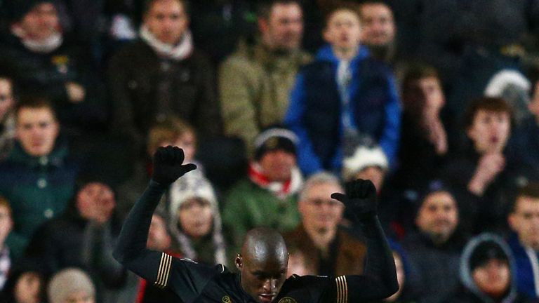 Marc-Antoine Fortune of Wigan celebrates after scoring his team's third goal in the FA Cup against MK Dons