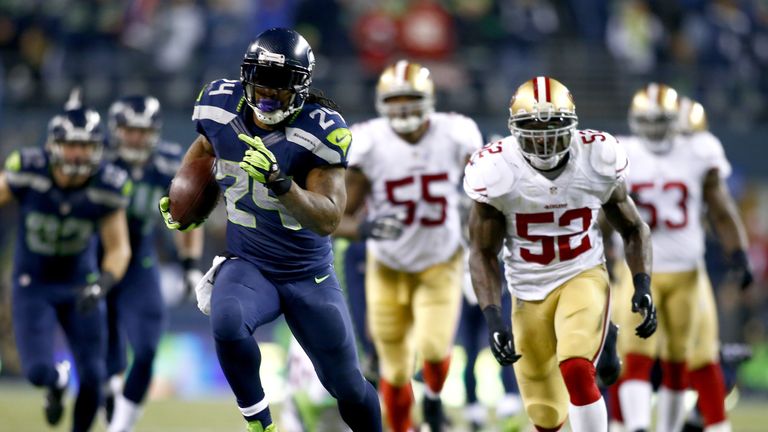 Marshawn Lynch #24 of the Seattle Seahawks runs for a 40-yard touchdown in the third quarter against the San Francisco 49ers