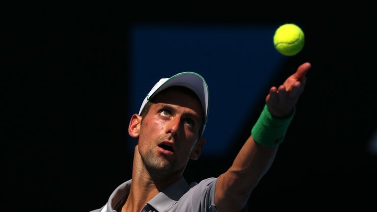 Novak Djokovic of Serbia serves in his second round match against Leonardo Mayer of Argentina during day three of the Australian Open