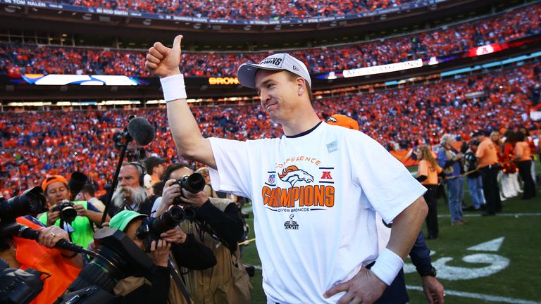 Peyton Manning #18 of the Denver Broncos celebrates after they the AFC Championship Game