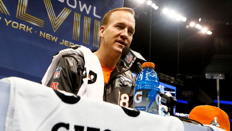 Quarterback Peyton Manning of the Denver Broncos speaks to the media during Super Bowl XLVIII Media Day