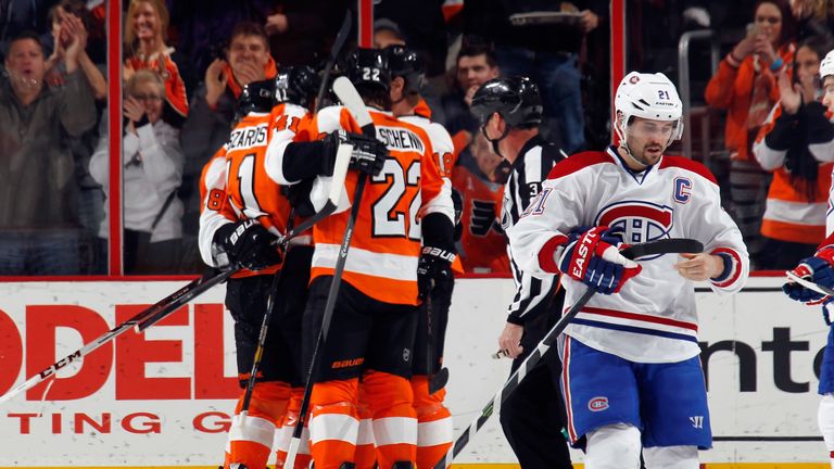 Philadelphia Flyers celebrate a goal by Zac Rinaldo #36 at 14:39 of the first period against the Montreal Canadiens 