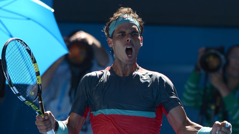 Rafael Nadal shouts as he celebrates winning a point during his men's singles match against Grigor Dimitrov on day ten of the 2014 Australian Open
