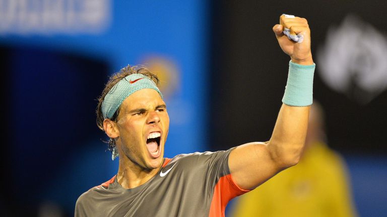 Spain's Rafael Nadal celebrates his victory against Switzerland's Roger Federer during their men's singles semi-final match on day 12 of the 2014 Australia