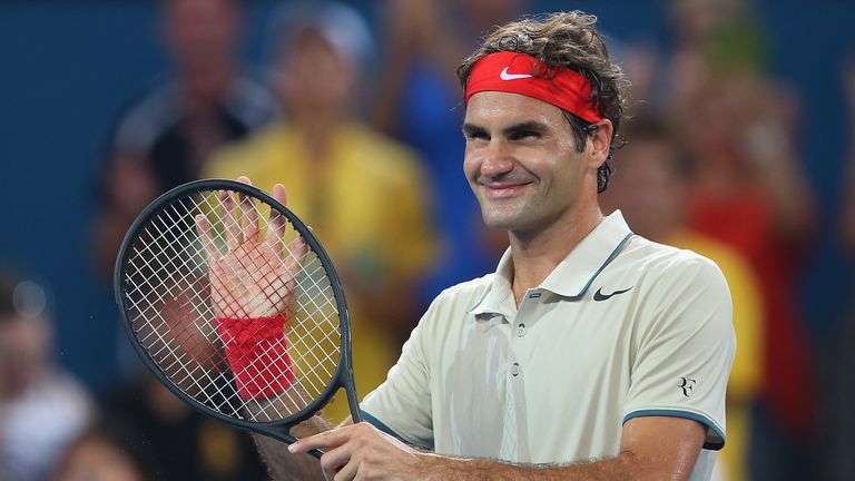 Roger Federer celebrates winning his semi-final match at the Brisbane International