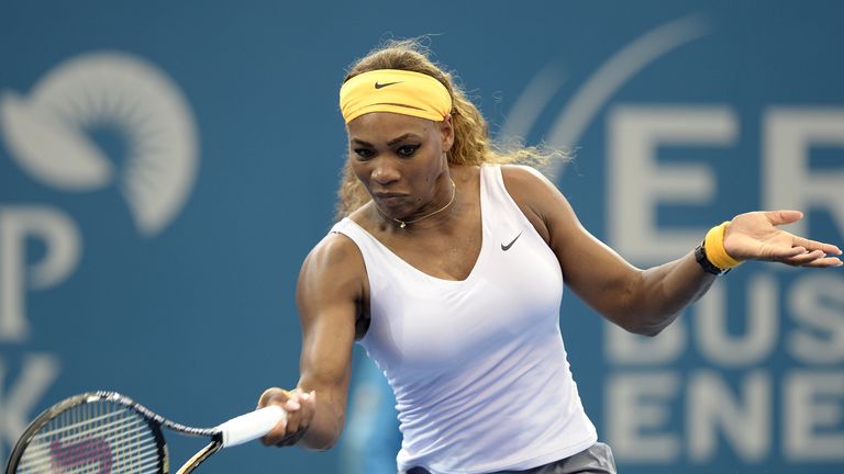 Serena Williams  plays a forehand in her match against Dominika Cibulkova at the Brisbane International
