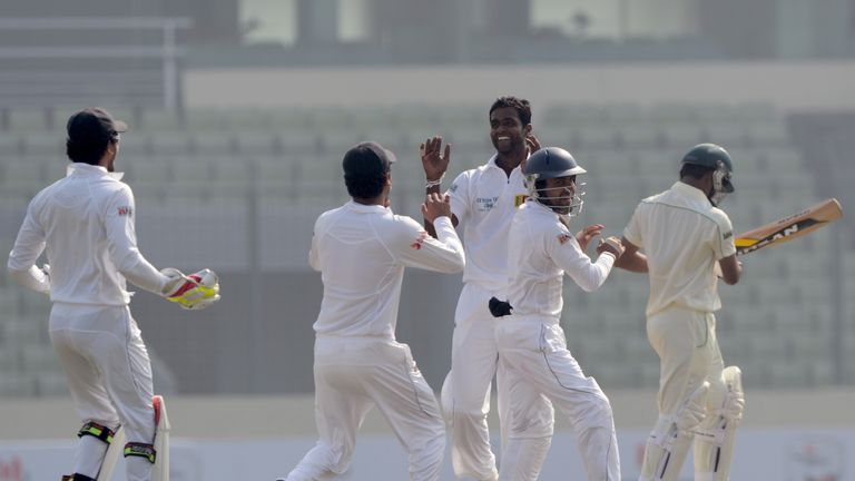 Shaminda Eranga (C) of Sri Lanka celebrates on day one of the first Test against Bangladesh