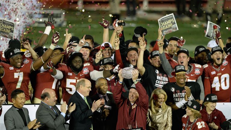 PASADENA, CA - JANUARY 06:  Florida State Seminoles head coach Jimbo Fisher holds the Coaches' Trophy after defeating the Auburn Tigers 34-31 in the 2014 V