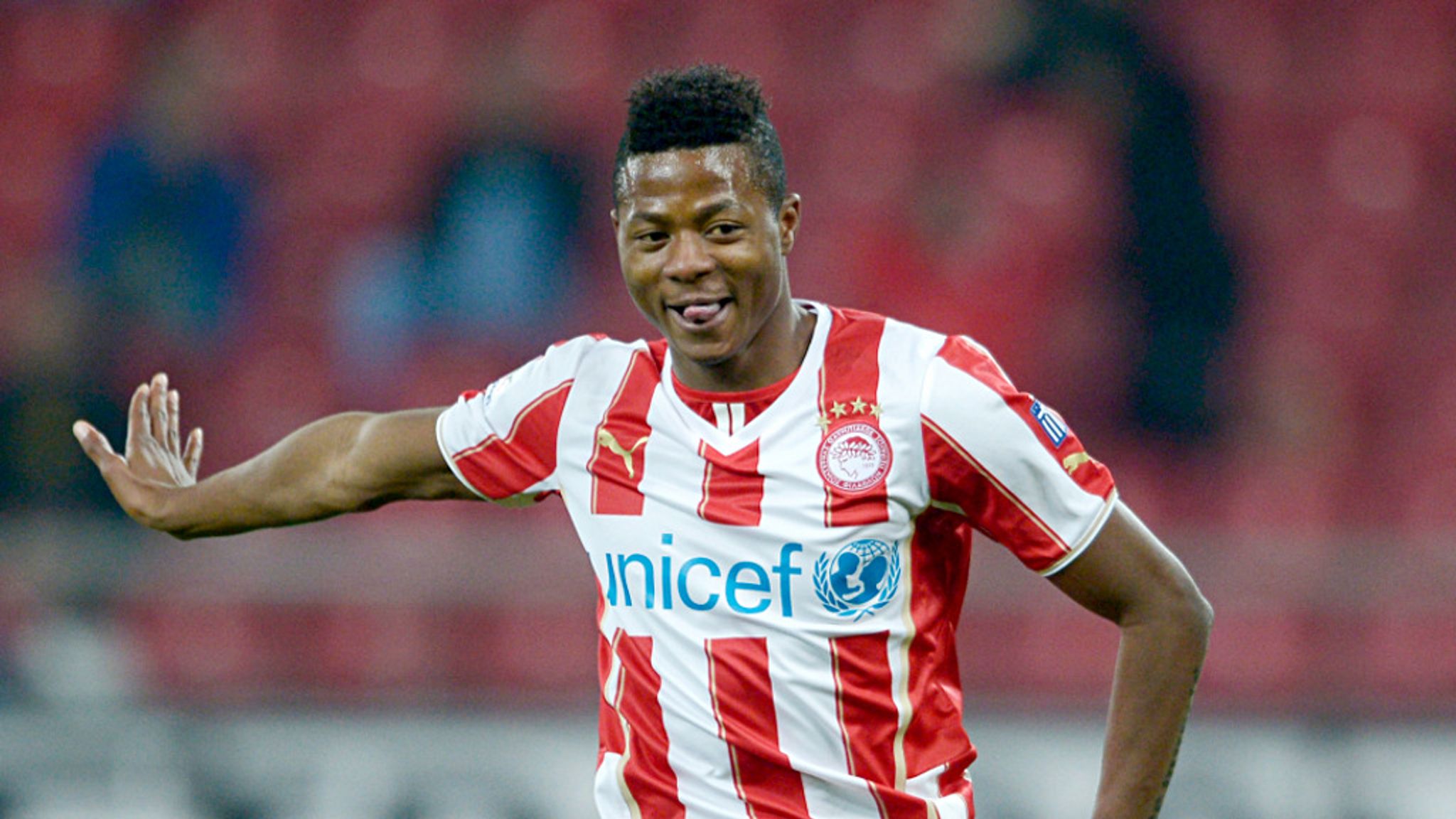 Michael Olaitan in 'good condition' after collapsing during Olympiakos ...