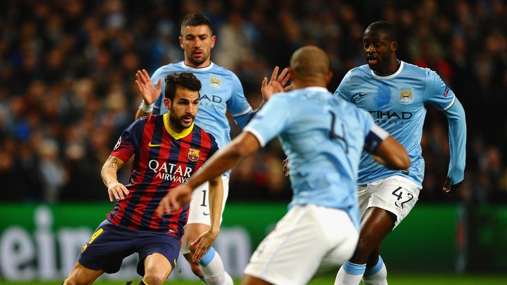 Cesc Fabregas of Barcelona in action against Manchester City