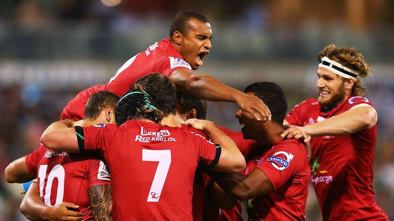 The Reds celebrate after Chris Feauai-Sautia&#39;s late try beat the Brumbies