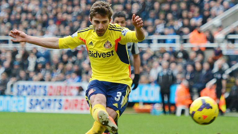 - Fabio Borini of Sunderland scores his teams opening goal from, the penalty spot