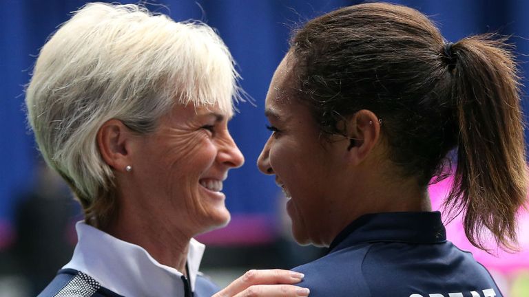 - Heather Watson R of Great Britain celebrate victory with team captain Judy Murray L against Jelena Ostapenko of Latvia during the day one Fed Cup Fed Cup