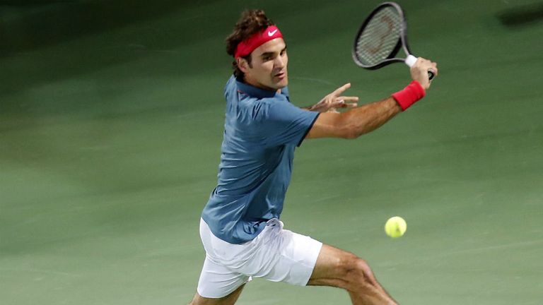 - Switzerlands Roger Federer serves the ball to Novak Djokovic of Serbia during their semi-final match in the ATP Dubai Duty Free Tennis Championships