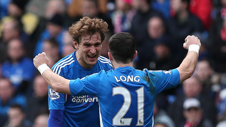 CARDIFF, WALES - FEBUARY 22: Nikica Jelavic of Hull celebrates with team mate Shane Long after scoring the team's second goal during the Barclays Premier L